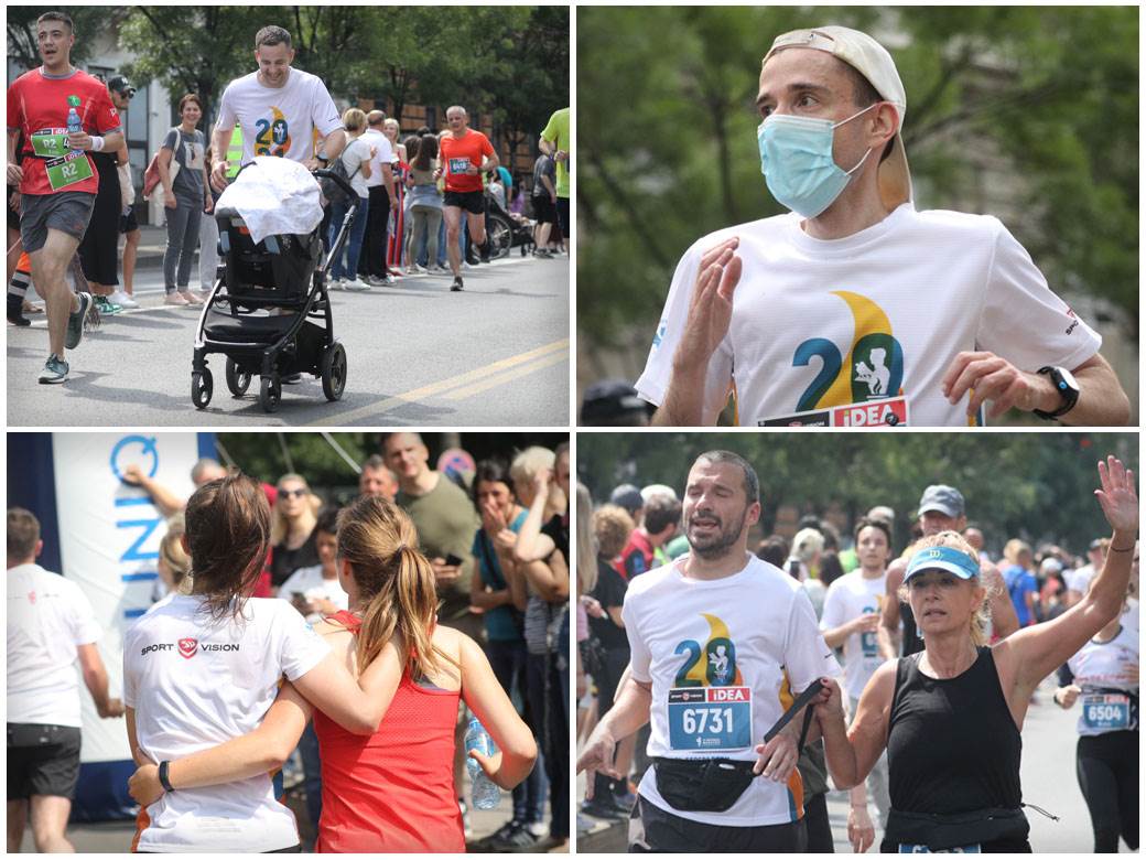  beogradski maraton trcao s bebom slep trkac maska na licu drzanje za ruke foto 