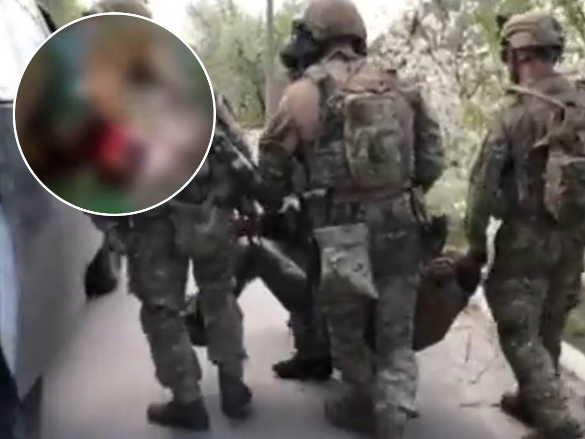  Član grupe Vagner seče glavu ukrajinskom vojniku 