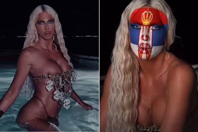  Jelena Karleuša u bazenu s filterom zastave Srbije preko lica 